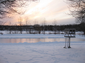 winter time with the swimming area turned into a skating rink